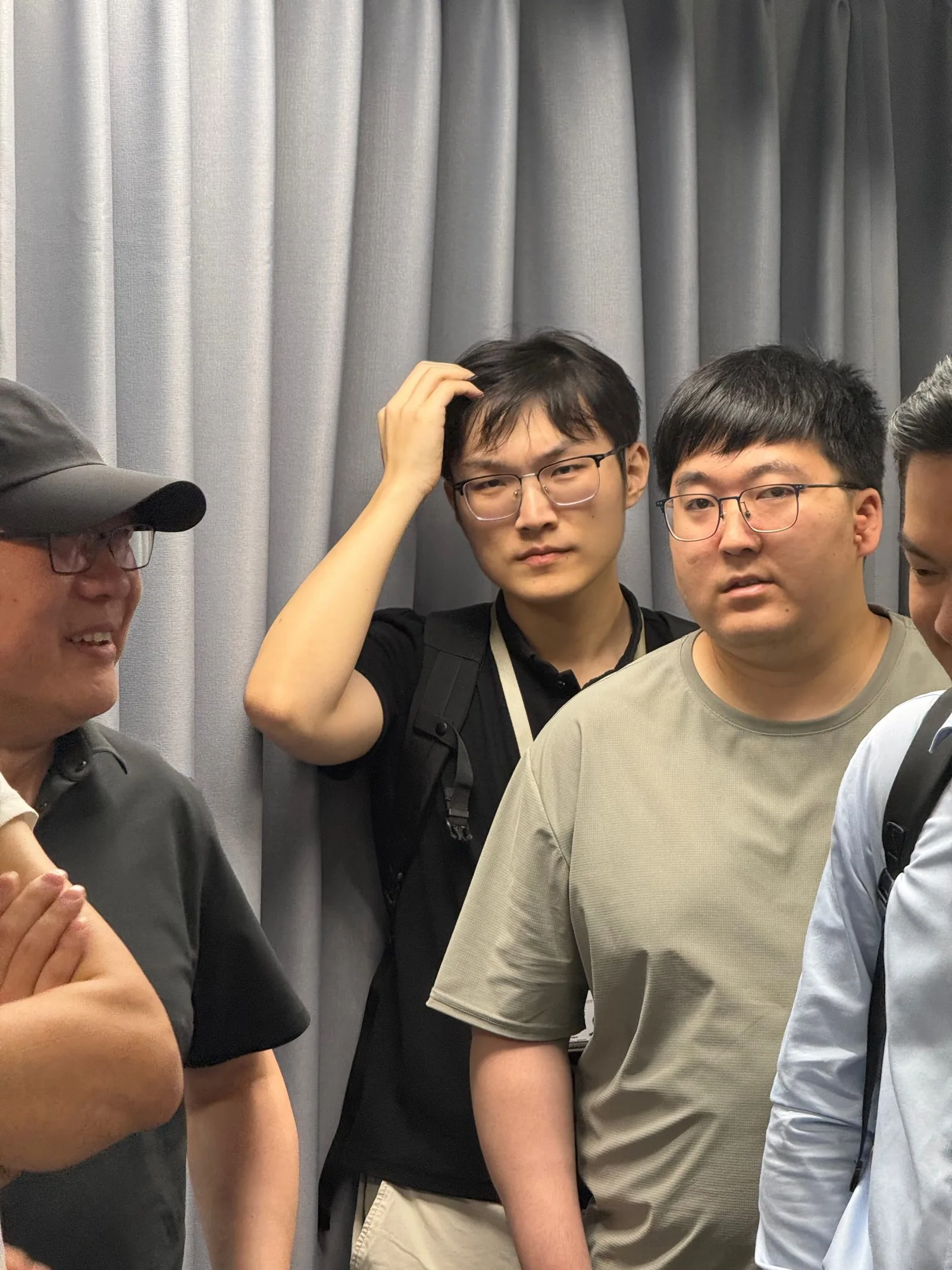 First from the left is Professor Z. Y. Dong, Head of Department. I am on the right, wearing glasses and an olive-green T-shirt.
