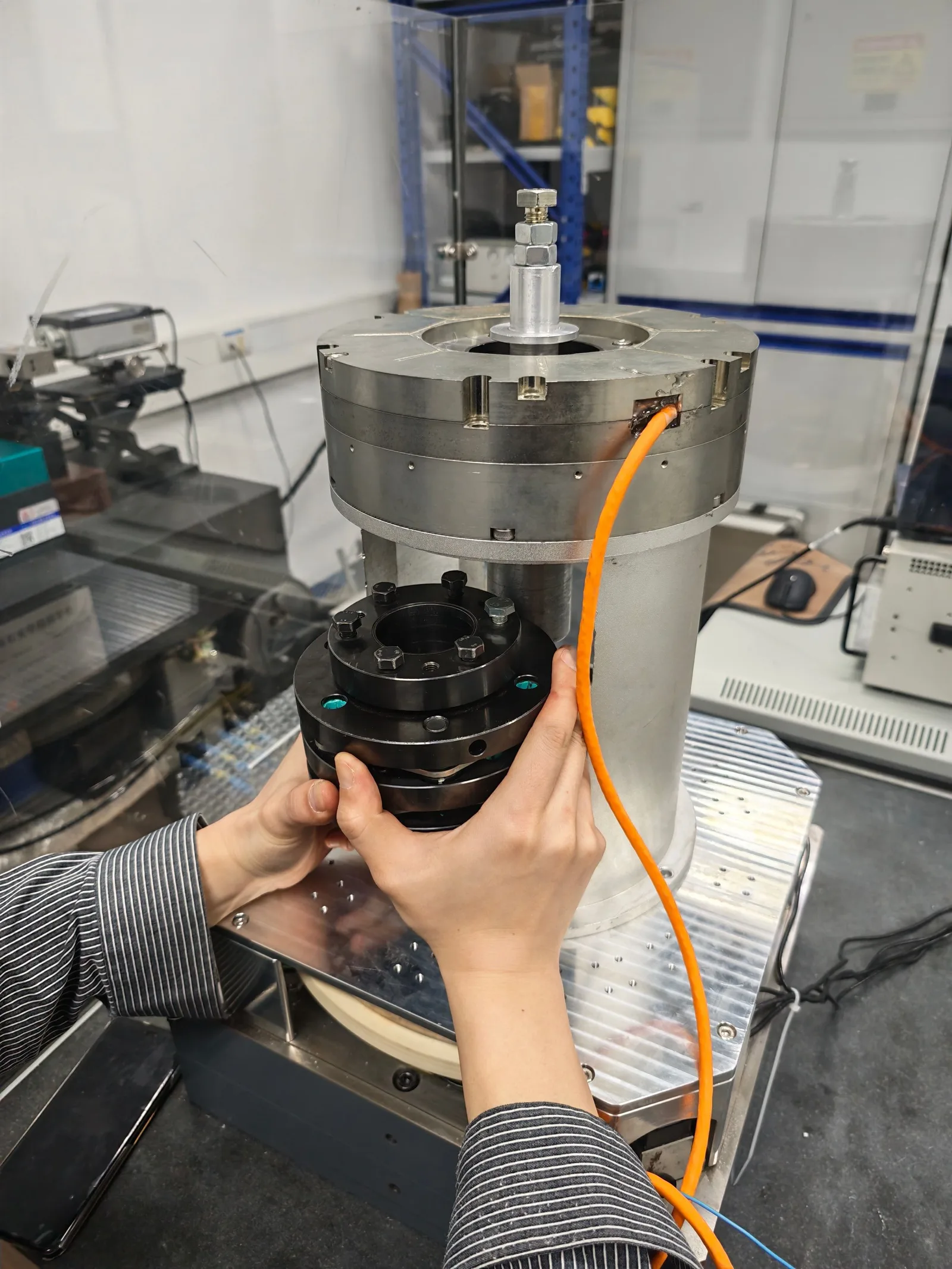 A photo of us running experiments in the angle metrology laboratory.